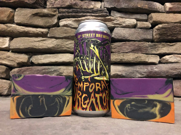 purple black orange yellow green beer soap made with temporal purgatory session ale from 18th street brewery indiana craft beer soap with activated charcoal by spunkndisorderly craft beer soaps