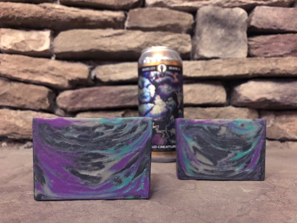 craft beer soap handcrafted by spunkndisorderly craft beer soaps purple teal silver and black beer soap for her cold process soap with activated charcoal beer soap handmade in Indiana with cloud creatures DDH hazy ipa double dry hopped hazy India pale ale from Indiana city brewing company Indianapolis brewery