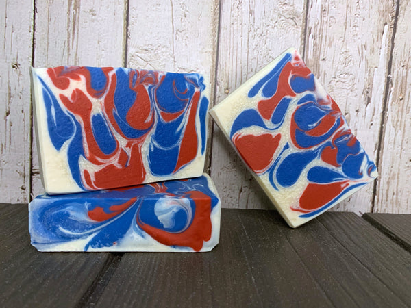 nowhere but texas beer soap handmade in texas with nowhere but texas lager from legal draft beer company Arlington texas brewery blue white and red beer soap patriotic swirl texas beer soap by spunkndisorderly beer soaps
