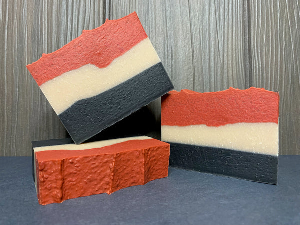 layered beer soap black cream and red beer soap for him with activated charcoal by spunkndisorderly craft beer soaps made with Alaska beer from alaskan brewing company