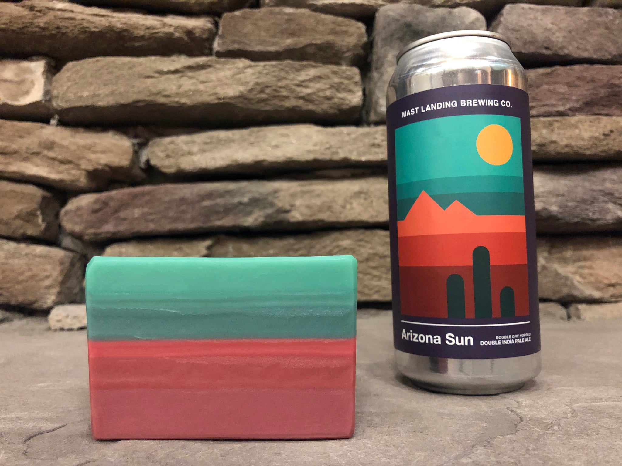 craft beer soap by spunkndisorderly handmade with arizona sun double dry hopped double India pale ale from mast landing brewing co Maine craft brewery striped orange and teal beer soap for him with activated charcoal 