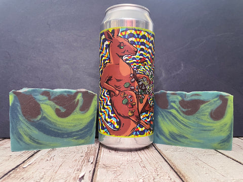 Tripping Animals Aussie Sweetness beer can between two bars of green blue and brown swirl beer soap