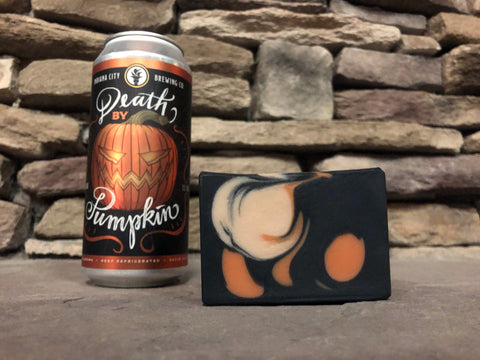 black orange and white beer soap with activated charcoal made with death by pumpkin ale by indiana city brewing company beer soap by spunkndisorderly craft beer soaps spunkndisorderly.com