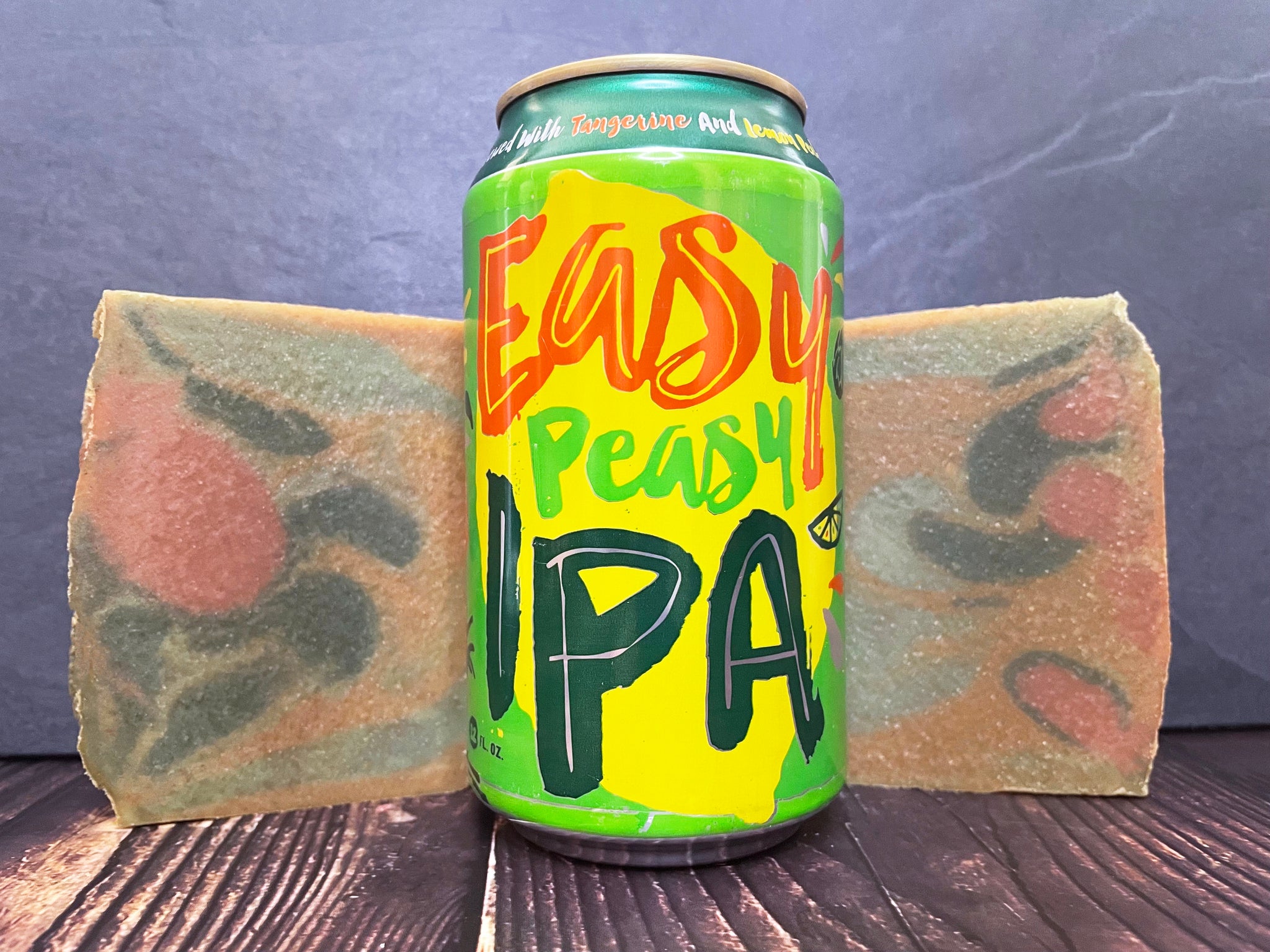deep ellum brewing company easy peasy ipa can between two bars of beer soap on a wooden surface