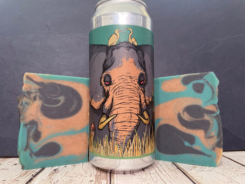 beer can with elephant design between two teal coral and black bars of beer soap by spunkndisorderly craft beer soap
