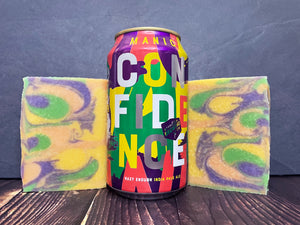 Deep Ellum Brewing Co. manic confidence beer can between two bars of ipa beer soap on a wooden surface