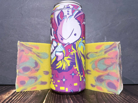 Martin house brewing company milkshake mochi beer can with anime bunny motif between two bars of yellow pink blue and purple swirl beer soap on a wooden surface