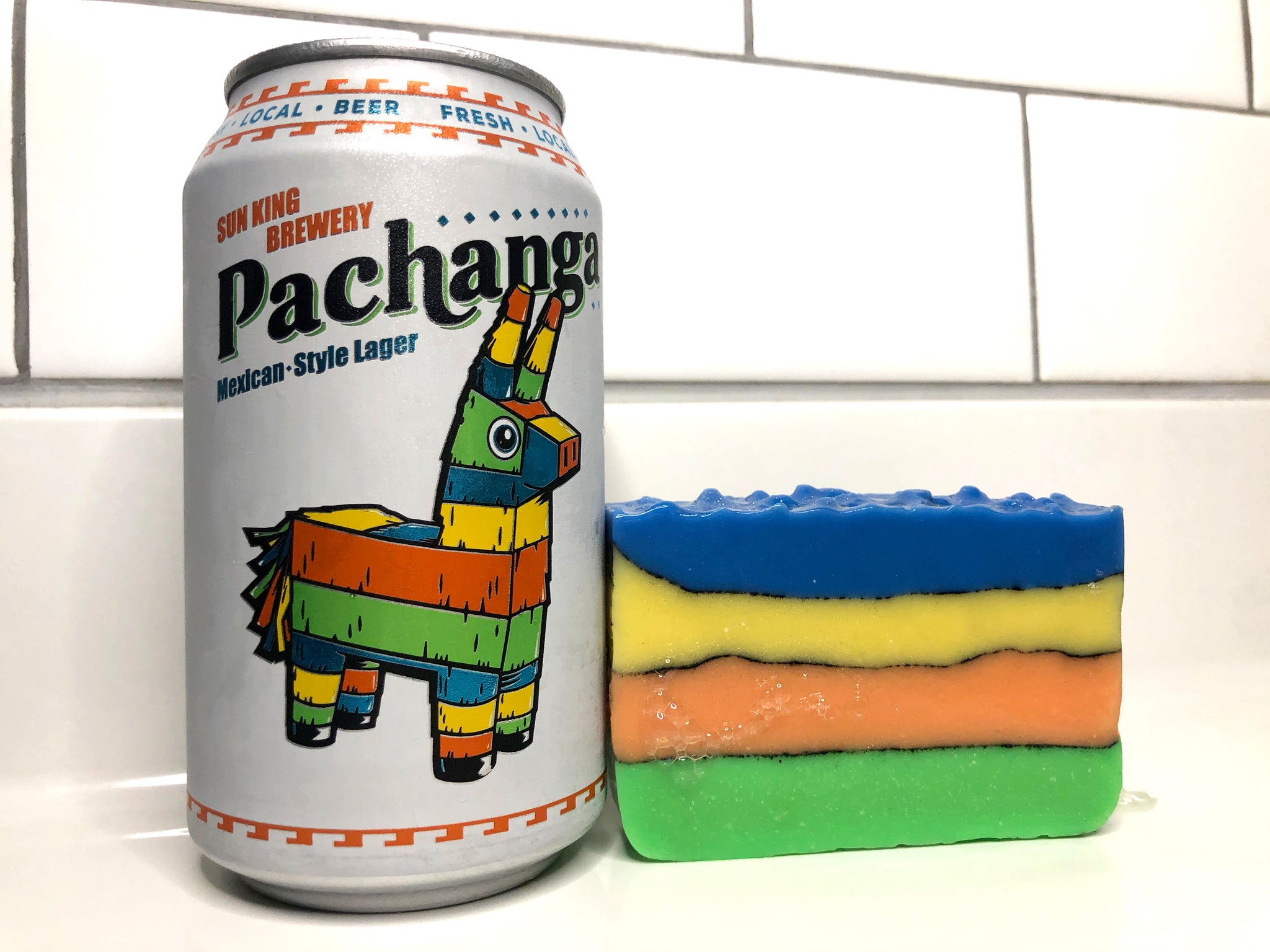 blue yellow orange green beer soap with activated charcoal made with pachanga Mexican style lager from sun king brewing beer soaps by spunkndisorderly craft beer soap