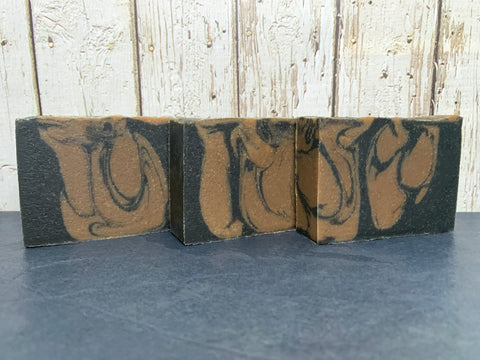 brown and black beer soap with activated charcoal handmade in texas with scaredy Katz pumpkin amber ale from holler brewing co in collaboration with Katz coffee beer soap by spunkndisorderly craft beer soaps texas beer soap