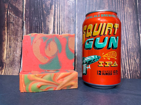 orange and green swirl beer soap made with squirt gun ipa from real ale brewing co texas craft beer soap by spunkndisorderly beer soaps spunkndisorderly.com