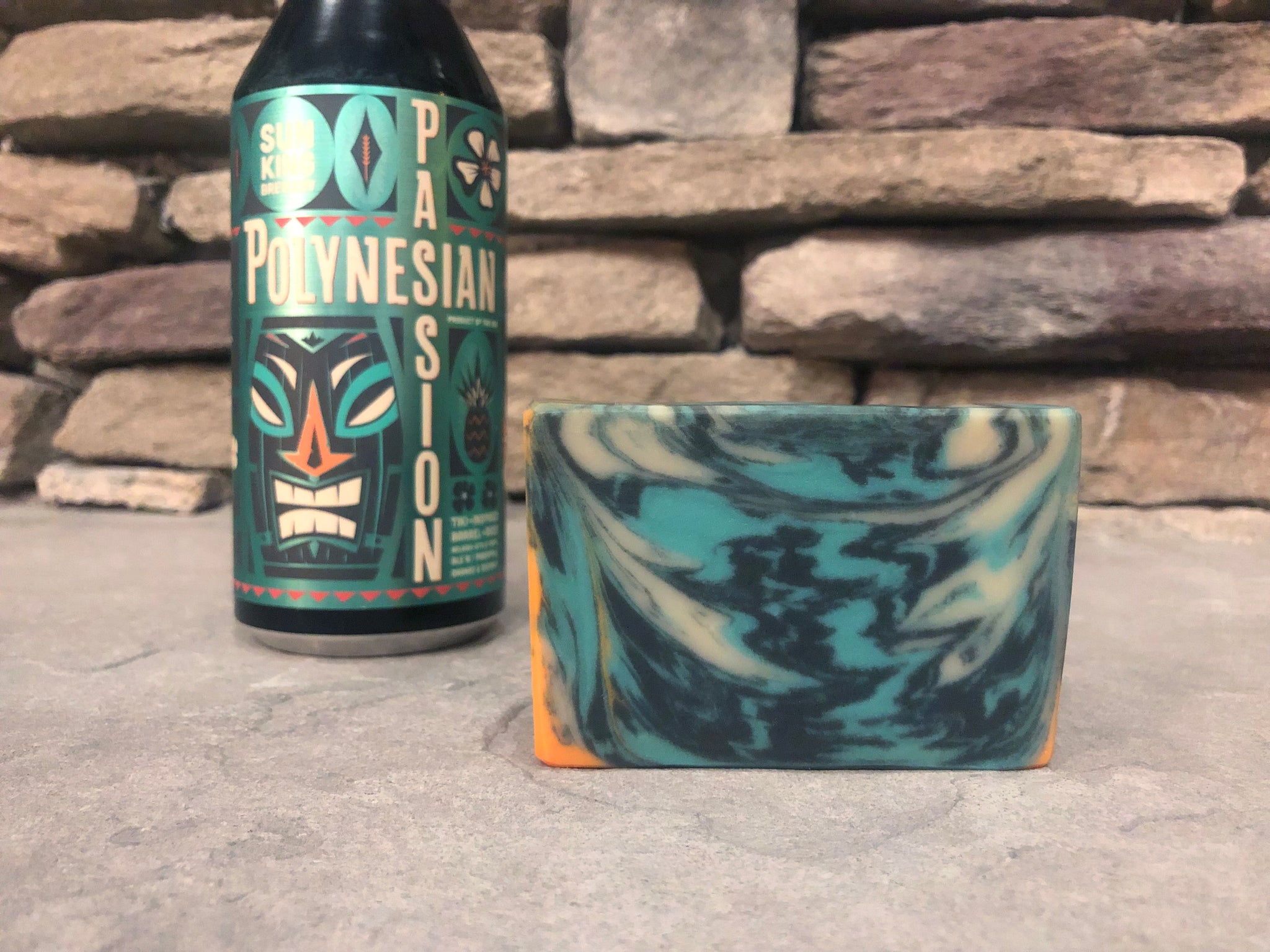 teal cream orange and black beer soap with activated charcoal made with Polynesian passion barrel aged beer from sun king brewing beer soap by spunkndisorderly beer soaps