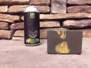 black voodoo lemon lime slushy xxl 450 north brewing company beer can beside a bar of black green and grey swirl beer soap by spunkndisorderly beer soaps on a grey rock surface