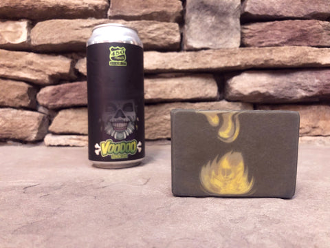 black voodoo lemon lime slushy xxl 450 north brewing company beer can beside a bar of black green and grey swirl beer soap by spunkndisorderly beer soaps on a grey rock surface