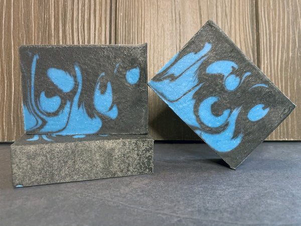 blue and black craft beer soap handmade in Texas with black & blueberry milk stout from walking stick brewing company Houston Texas craft brewery blue and black swirl soap for him with activated charcoal spunkndisorderly craft beer soaps