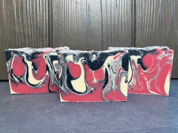 white black and pink beer soap for her handmade in texas by spunkndisorderly craft beer soaps cold process beer soap with activated charcoal cold process drop swirl spunkndisorderly craft beer soap handmade in texas with stripper dust vanilla porter from pappy slokum brewing co Abilene texas craft brewery