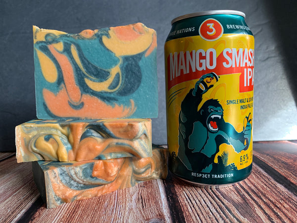 craft beer soap handmade in texas with mango smash ipa beer from 3 nations brewing co orange blue and yellow mango craft beer soap spunkndisorderly