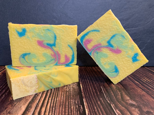 yellow pink and blue craft beer soap handmade in texas with passion for humanity sour beer from no label brewing company passionfruit beer soap tropical fruit scented soap for him spunkndisorderly