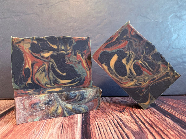 beer soap with activated charcoal handmade in texas with the floor is java stout. from no label brewing company Katy texas craft brewery red yellow green beer soap with coffee seed oil spunkndisorderly