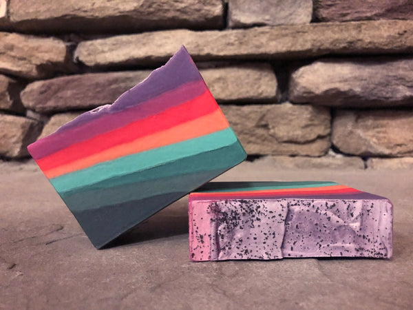 ocean sunset inspired cold process soap Maine beer soap handmade with wavy days ddh ipa from mast landing brewing company Westbrook Maine craft brewery beer soap for him with activated charcoal and topped with Black Sea salt spunkndisorderly craft beer soaps striped soap for him