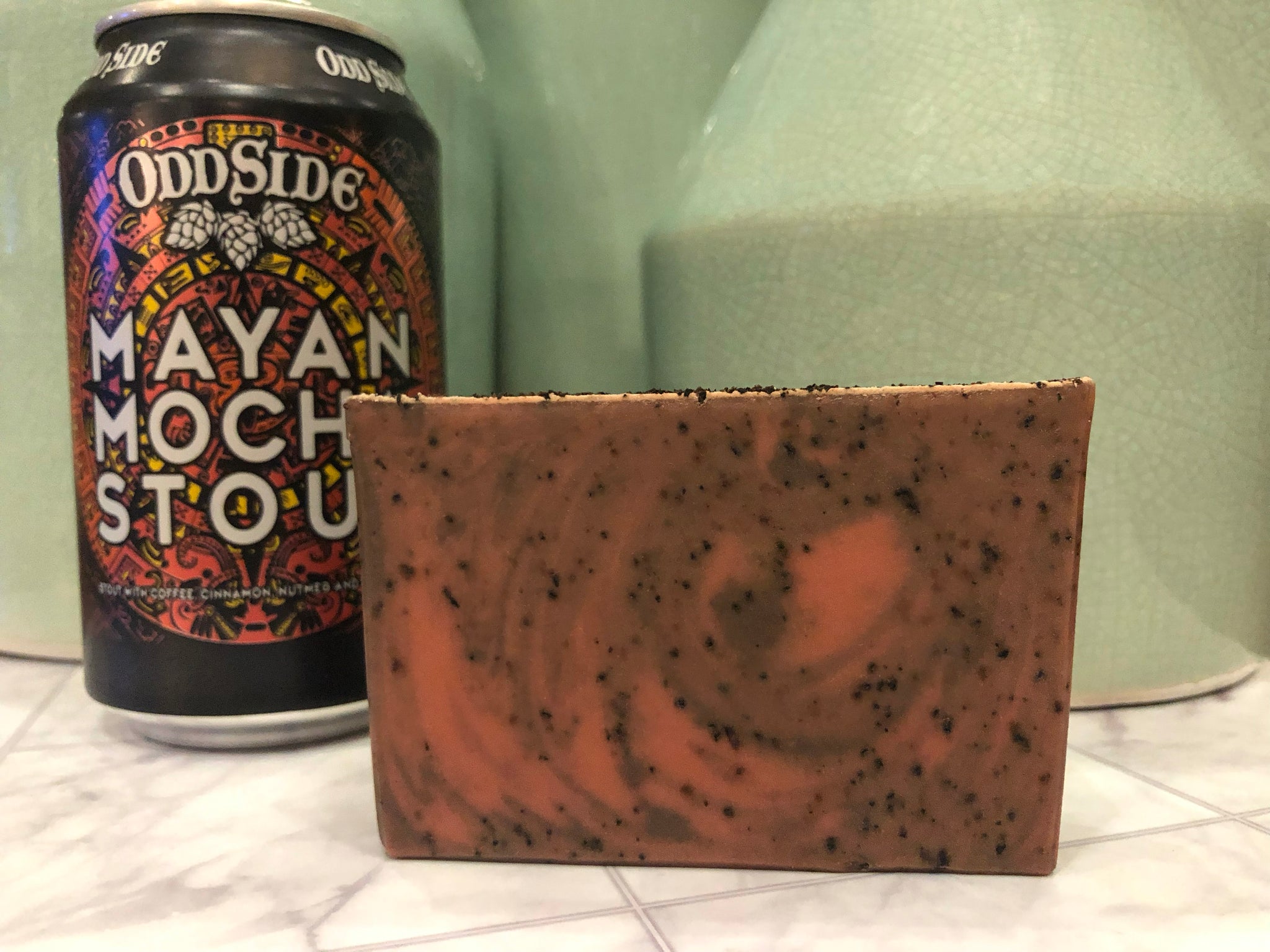 Michigan beer soap handcrafted with mayan mocha stout Michigan craft beer from odd side ales grand haven Michigan craft brewery coffee beer soap for him with exfoliation cold process coffee beer soap with coffee grounds orange and brown swirl cold process soap with exfoliating coffee grounds handcrafted by spunkndisorderly craft beer soaps