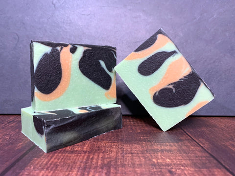 cold process beer soap for him with activated charcoal by spunkndisorderly beer soaps black gold and teal swirl beer soap for him made with cosmic cowboy American ipa from family business beer company