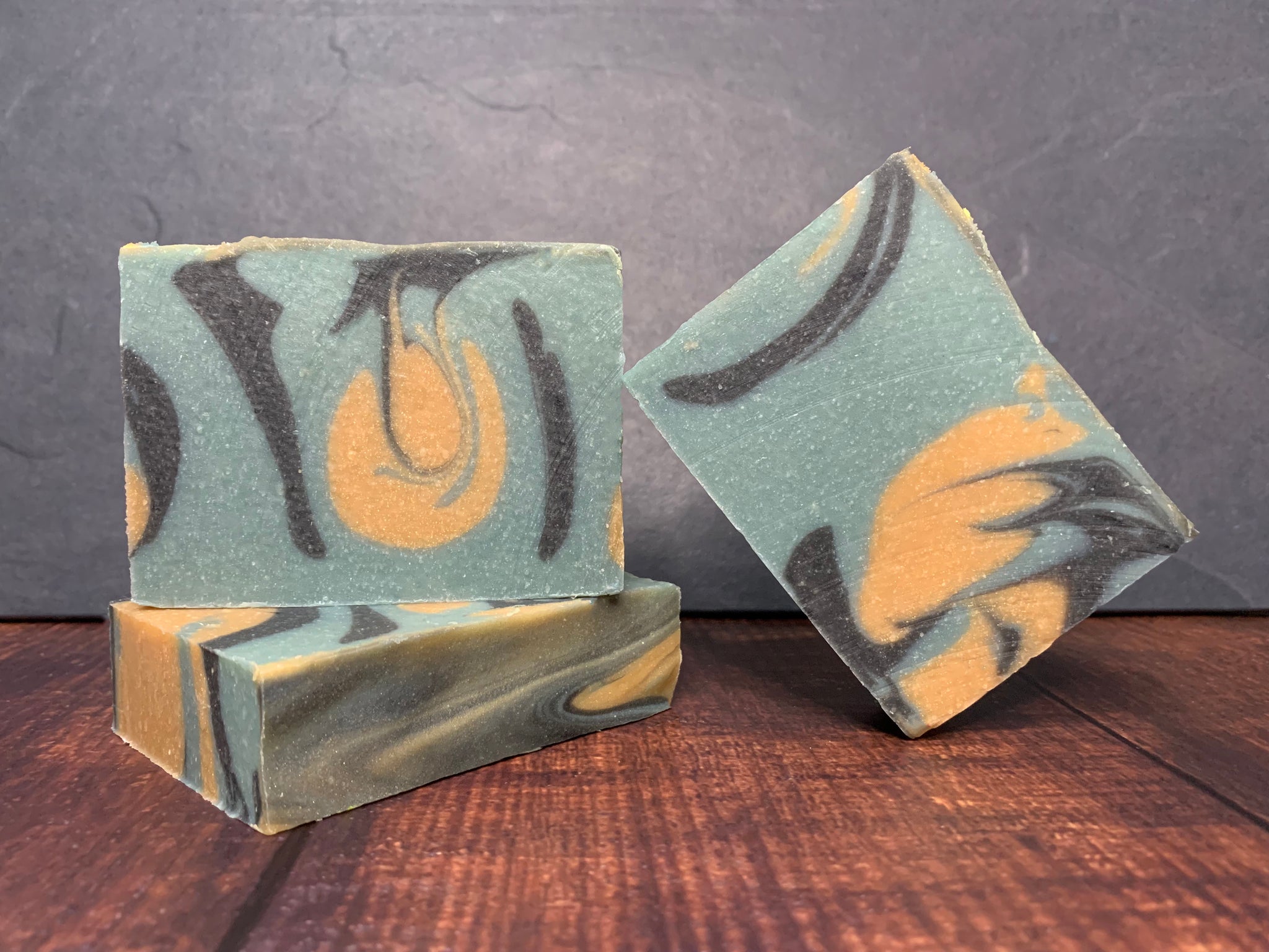 summer time beer soap for him handmade in texas with Hamilton pale American pale ale from family business beer co texas craft brewery black gold and blue beer soap for him with activated charcoal handcrafted by spunkndisorderly beer soaps cold process swirl beer soap