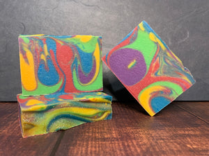 rainbow swirl beer soap handcrafted in texas with texas craft beer blue red green yellow purple beer soap topped with eco-glitter craft beer soaps for sale by spunkndisorderly beer soaps