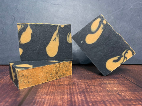 gold and black beer soap with activated charcoal handmade in texas with texas craft beer the grackle imperial stout from family business beer company texas craft brewery gold topped soap craft beer soap for sale by spunkndisorderly beer soaps